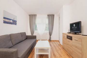 Фото номера Апартаменты с 1 спальней Апартаменты Jantar Apartamenty- Zielone Tarasy г. Колобжег 5