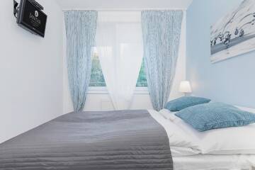 Фото номера Апартаменты с 1 спальней Апартаменты Jantar Apartamenty- Zielone Tarasy г. Колобжег 10