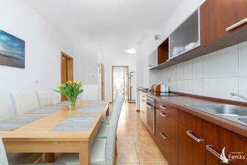 Фото номера Апартаменты Делюкс Апартаменты Feniks Apartamenty - Holiday Home г. Колобжег 4