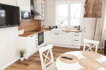 Фото номера Апартаменты Делюкс Апартаменты Feniks Apartamenty - Holiday Home г. Колобжег 11