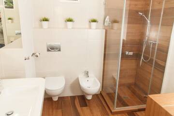 Фото номера Апартаменты Делюкс Апартаменты Feniks Apartamenty - Holiday Home г. Колобжег 14
