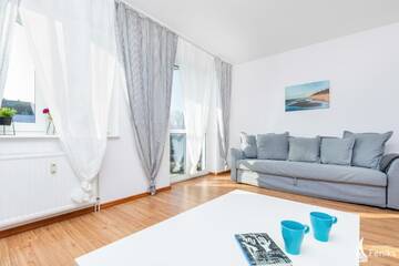 Фото номера Апартаменты Делюкс Апартаменты Feniks Apartamenty - Holiday Home г. Колобжег 21
