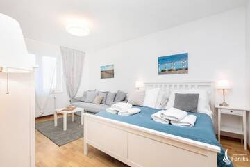 Фото номера Апартаменты Делюкс Апартаменты Feniks Apartamenty - Holiday Home г. Колобжег 18