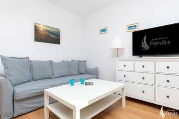 Фото номера Апартаменты Делюкс Апартаменты Feniks Apartamenty - Holiday Home г. Колобжег 19