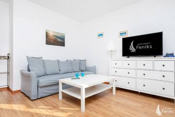 Фото номера Апартаменты Делюкс Апартаменты Feniks Apartamenty - Holiday Home г. Колобжег 23