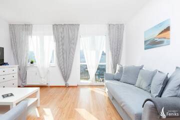 Фото номера Апартаменты Делюкс Апартаменты Feniks Apartamenty - Holiday Home г. Колобжег 26