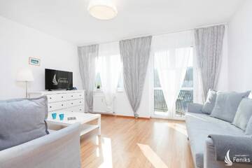 Фото номера Апартаменты Делюкс Апартаменты Feniks Apartamenty - Holiday Home г. Колобжег 27