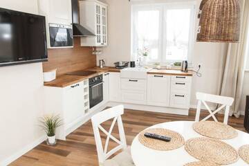 Фото номера Апартаменты Делюкс Апартаменты Feniks Apartamenty - Holiday Home г. Колобжег 5