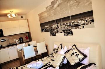 Фото номера Номер-студио с видом на бассейн Апартаменты Apartamenty Kołobrzeg Apartments Polanki г. Колобжег 32