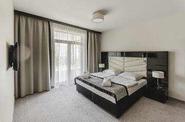 Фото номера Улучшенный четырехместный номер Курортные отели Diune Resort by Zdrojowa г. Колобжег 2