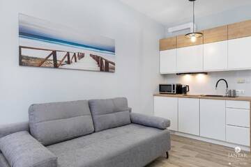 Фото номера Номер-студио с балконом Апартаменты Jantar Apartamenty -Prestige Portowa г. Колобжег 4