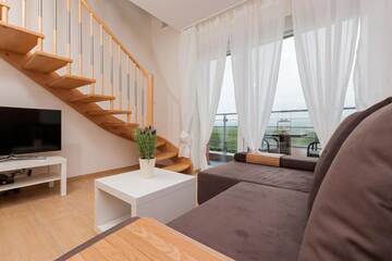 Фото номера Апартаменты в пентхаусе с видом на реку — Portowa, 14 Апартаменты Jantar Apartamenty -Prestige Portowa г. Колобжег 25