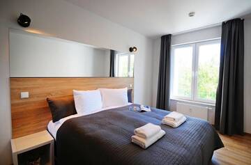 Фото номера Апартаменты с 1 спальней Апартаменты Apartamenty BalticON Polanki г. Колобжег 4