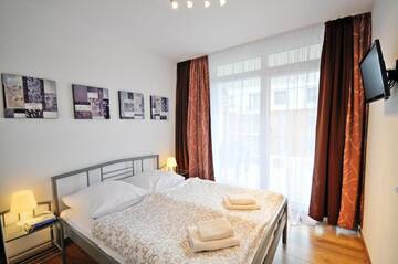 Фото номера Апартаменты с 2 спальнями Апартаменты Apartamenty BalticON Polanki г. Колобжег 6