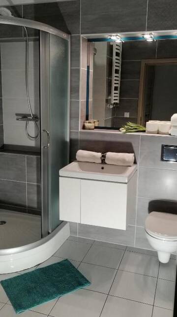 Фото номера Апартаменты с 2 спальнями Апартаменты Cicha Przystań - Apartamenty Port г. Колобжег 39