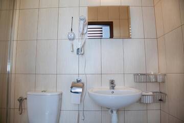 Фото номера Стандартный двухместный номер с 2 отдельными кроватями Курортные отели Sanatorium Muszelka г. Колобжег 26