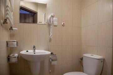 Фото номера Стандартный двухместный номер с 2 отдельными кроватями Курортные отели Sanatorium Muszelka г. Колобжег 30