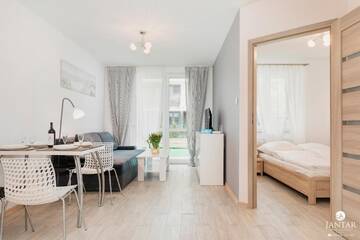 Фото номера Апартаменты с 1 спальней и видом на сад (4 взрослых) Апартаменты Jantar Apartamenty - Port Rybacki г. Колобжег 22