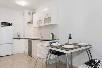 Фото номера Апартаменты с 1 спальней и видом на сад (4 взрослых) Апартаменты Jantar Apartamenty - Port Rybacki г. Колобжег 35
