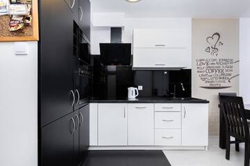 Фото номера Апартаменты с видом на сад Апартаменты Jantar Apartamenty - Port Rybacki г. Колобжег 13