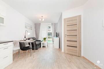 Фото номера Апартаменты с 1 спальней и видом на сад (4 взрослых) Апартаменты Jantar Apartamenty - Port Rybacki г. Колобжег 7