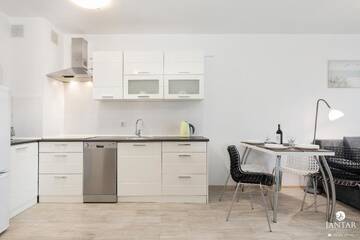 Фото номера Апартаменты с 1 спальней и видом на сад (4 взрослых) Апартаменты Jantar Apartamenty - Port Rybacki г. Колобжег 8