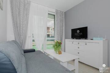 Фото номера Апартаменты с 1 спальней и видом на сад (4 взрослых) Апартаменты Jantar Apartamenty - Port Rybacki г. Колобжег 6