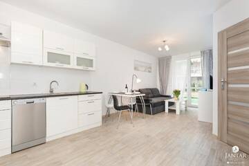 Фото номера Апартаменты с 1 спальней и видом на сад (4 взрослых) Апартаменты Jantar Apartamenty - Port Rybacki г. Колобжег 46