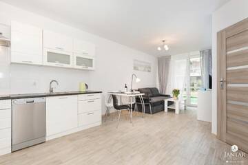 Фото номера Апартаменты с 1 спальней и видом на сад (4 взрослых) Апартаменты Jantar Apartamenty - Port Rybacki г. Колобжег 14
