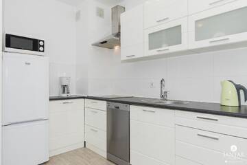 Фото номера Апартаменты с 1 спальней и видом на сад (4 взрослых) Апартаменты Jantar Apartamenty - Port Rybacki г. Колобжег 15