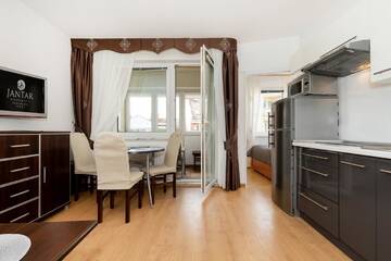 Фото номера Апартаменты с балконом Апартаменты Jantar Apartamenty - Port Kołobrzeg г. Колобжег 4