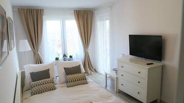Фото номера Апартаменты с видом на бассейн Апартаменты Kołobrzeg Apartamenty-Polanki z garażem г. Колобжег 7