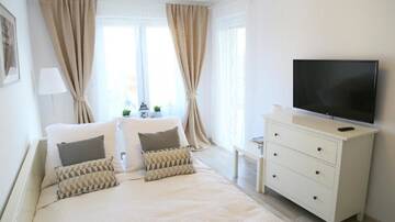 Фото номера Апартаменты с видом на бассейн Апартаменты Kołobrzeg Apartamenty-Polanki z garażem г. Колобжег 3