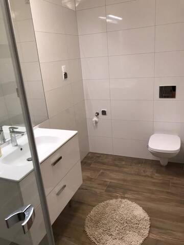 Фото номера Апартаменты Делюкс - Парк Полянки Апартаменты OMI Apartments г. Колобжег 23