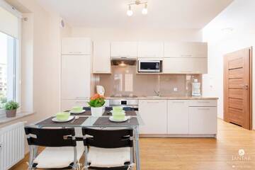 Фото номера Апартаменты с 2 спальнями Апартаменты Jantar Apartamenty - Family Vacation Polanki г. Колобжег 16