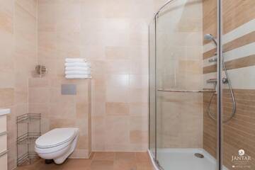Фото номера Апартаменты с 2 спальнями Апартаменты Jantar Apartamenty - Family Vacation Polanki г. Колобжег 7