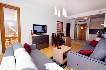 Фото номера Апартаменты с 1 спальней (для 1 - 6 взрослых) Апартаменты Apartament Deluxe Olympic Park VI Piętro г. Колобжег 8