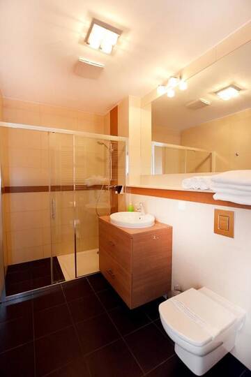 Фото номера Апартаменты с 1 спальней (для 1 - 6 взрослых) Апартаменты Apartament Deluxe Olympic Park VI Piętro г. Колобжег 77
