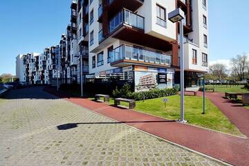 Фото номера Апартаменты с 1 спальней (для 1 - 6 взрослых) Апартаменты Apartament Deluxe Olympic Park VI Piętro г. Колобжег 52