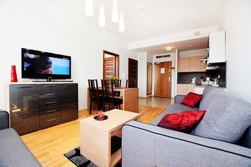 Фото номера Апартаменты с 1 спальней (для 1 - 6 взрослых) Апартаменты Apartament Deluxe Olympic Park VI Piętro г. Колобжег 11