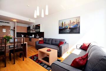 Фото номера Апартаменты с 1 спальней (для 1 - 6 взрослых) Апартаменты Apartament Deluxe Olympic Park VI Piętro г. Колобжег 12