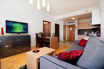 Фото номера Апартаменты с 1 спальней (для 1 - 6 взрослых) Апартаменты Apartament Deluxe Olympic Park VI Piętro г. Колобжег 19