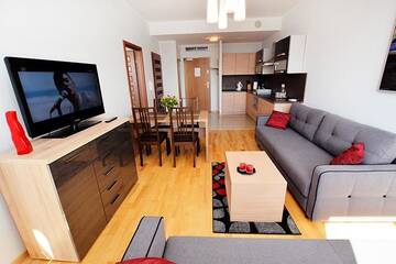 Фото номера Апартаменты с 1 спальней (для 1 - 6 взрослых) Апартаменты Apartament Deluxe Olympic Park VI Piętro г. Колобжег 14