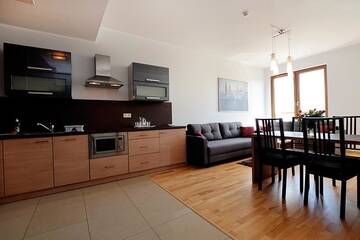 Фото номера Апартаменты с 1 спальней (для 1 - 6 взрослых) Апартаменты Apartament Deluxe Olympic Park VI Piętro г. Колобжег 20