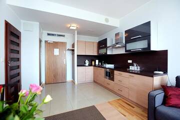Фото номера Апартаменты с 1 спальней (для 1 - 6 взрослых) Апартаменты Apartament Deluxe Olympic Park VI Piętro г. Колобжег 21