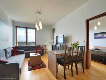 Фото номера Апартаменты с 1 спальней (для 1 - 6 взрослых) Апартаменты Apartament Deluxe Olympic Park VI Piętro г. Колобжег 22