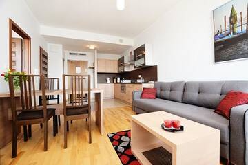 Фото номера Апартаменты с 1 спальней (для 1 - 6 взрослых) Апартаменты Apartament Deluxe Olympic Park VI Piętro г. Колобжег 24
