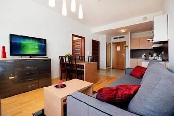 Фото номера Апартаменты с 1 спальней (для 1 - 6 взрослых) Апартаменты Apartament Deluxe Olympic Park VI Piętro г. Колобжег 61