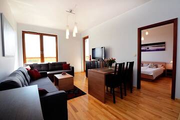 Фото номера Апартаменты с 1 спальней (для 1 - 6 взрослых) Апартаменты Apartament Deluxe Olympic Park VI Piętro г. Колобжег 10