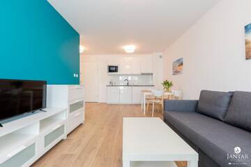 Фото номера Апартаменты с 1 спальней Апартаменты Jantar Apartamenty Bliżej Morza г. Колобжег 11